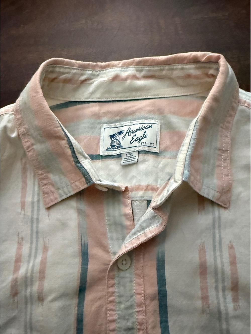 american eagle short sleeve button-up shirt with pastel stripes